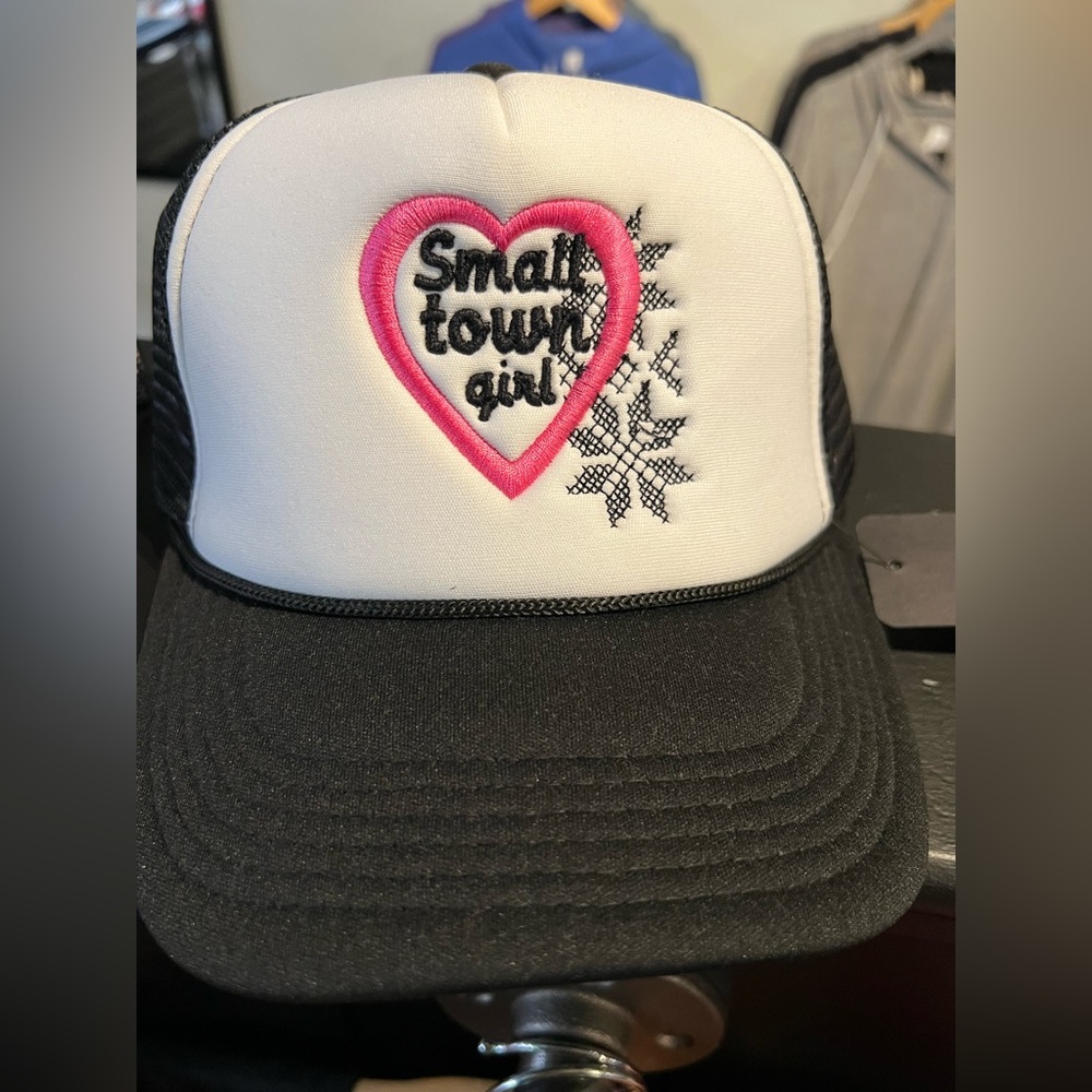 Small Town Girl embroidered ponytail trucker hat.